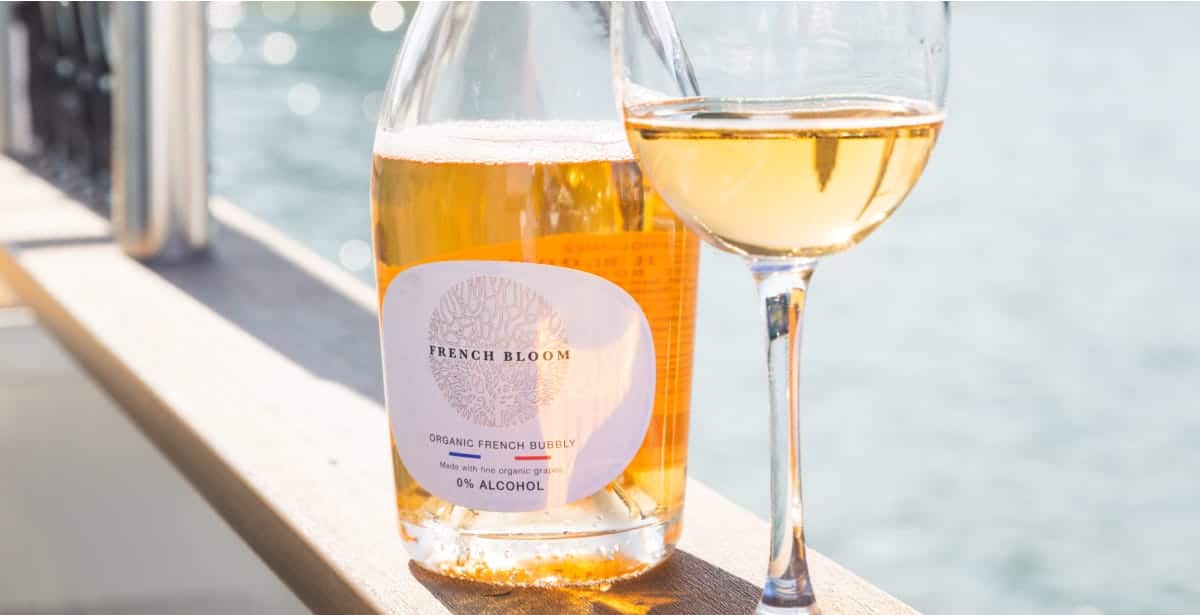 a bottle of wine and a wine glass