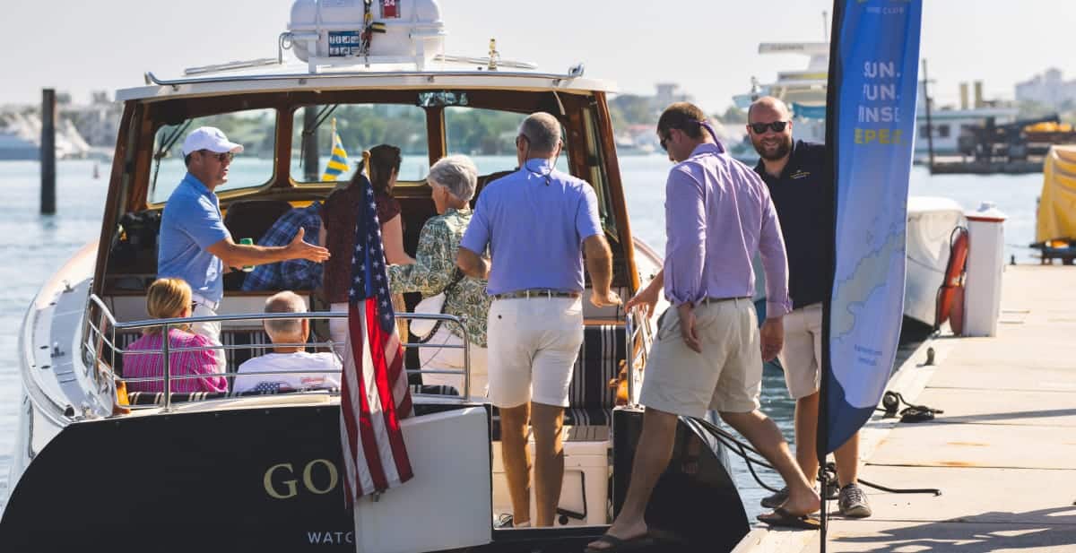 men getting on a boat