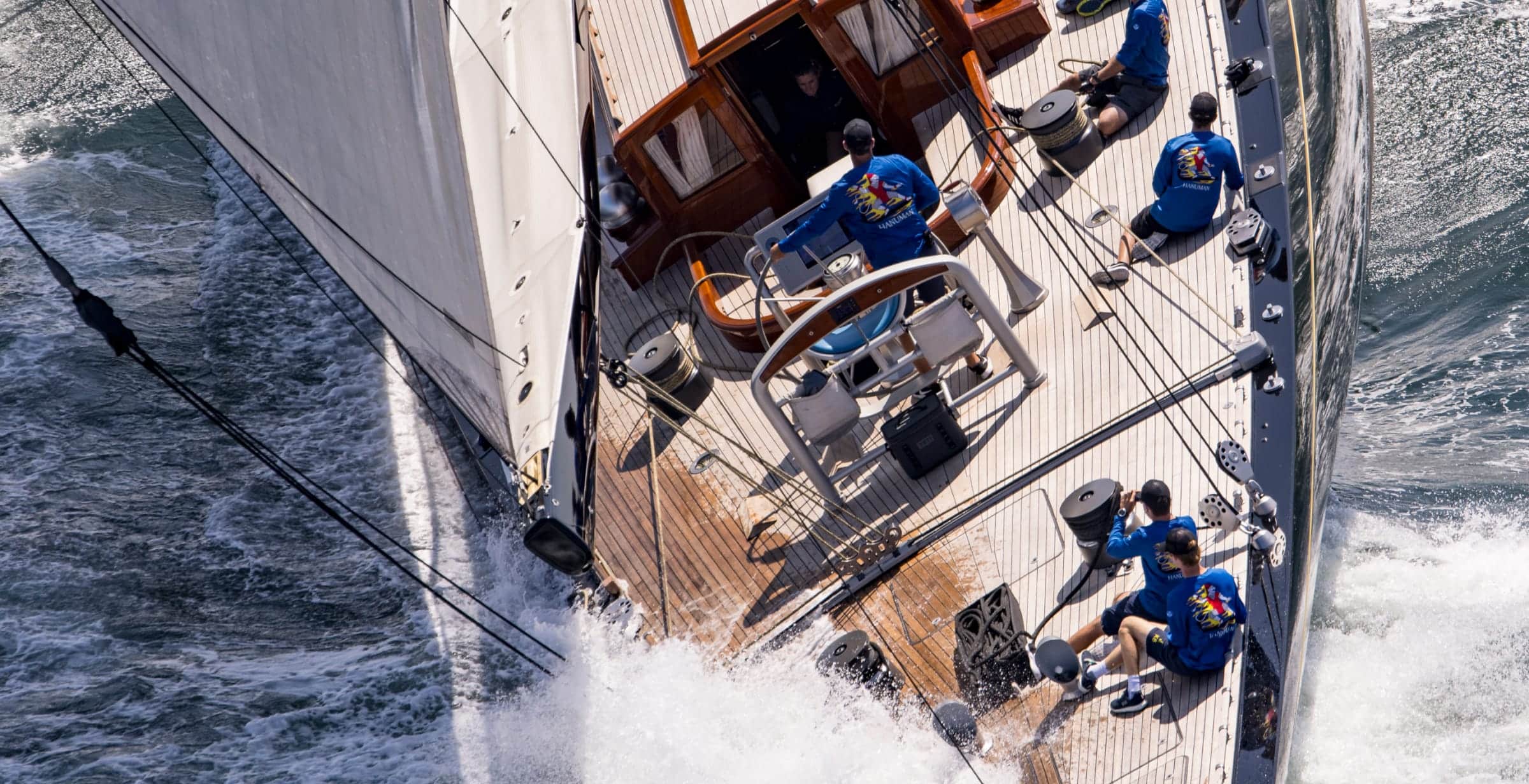 aerial shot of sailboat and crew